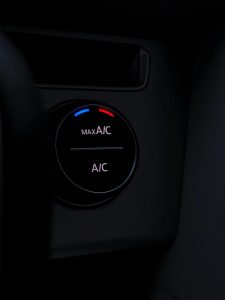 why is my ac squealing in my car